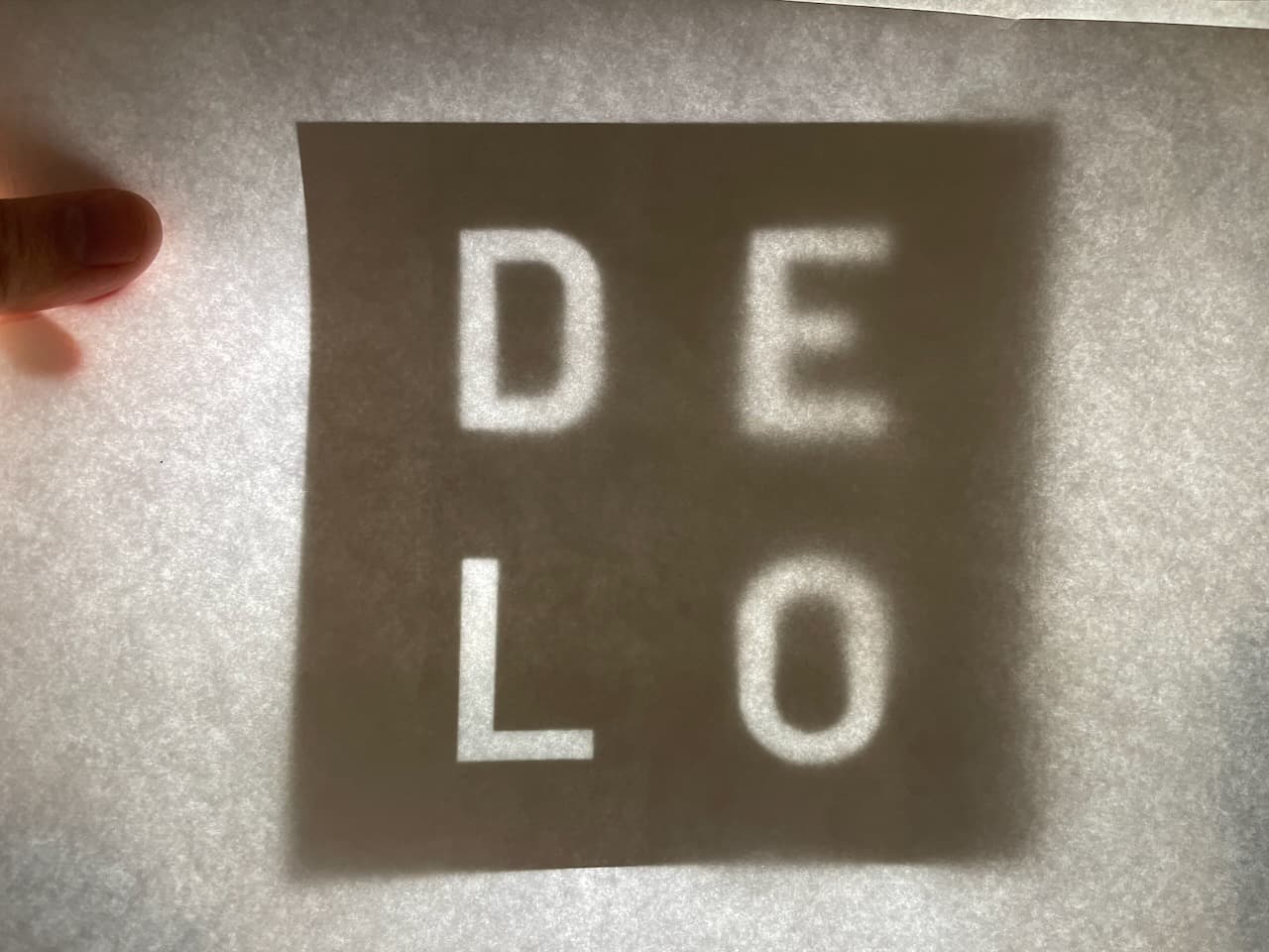 Light diffusion experiments while designing the DELO logo